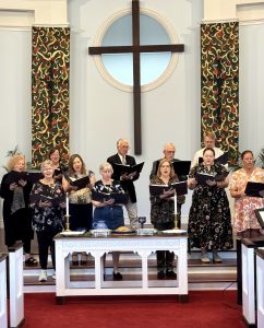 6229151075098353729 choir singing in front or church cross